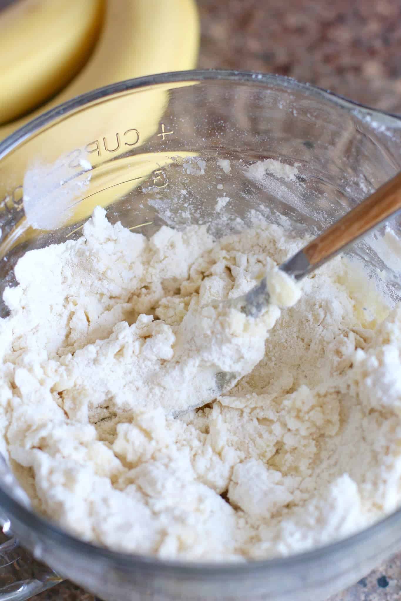 butter and flour added together in a glass bowl.