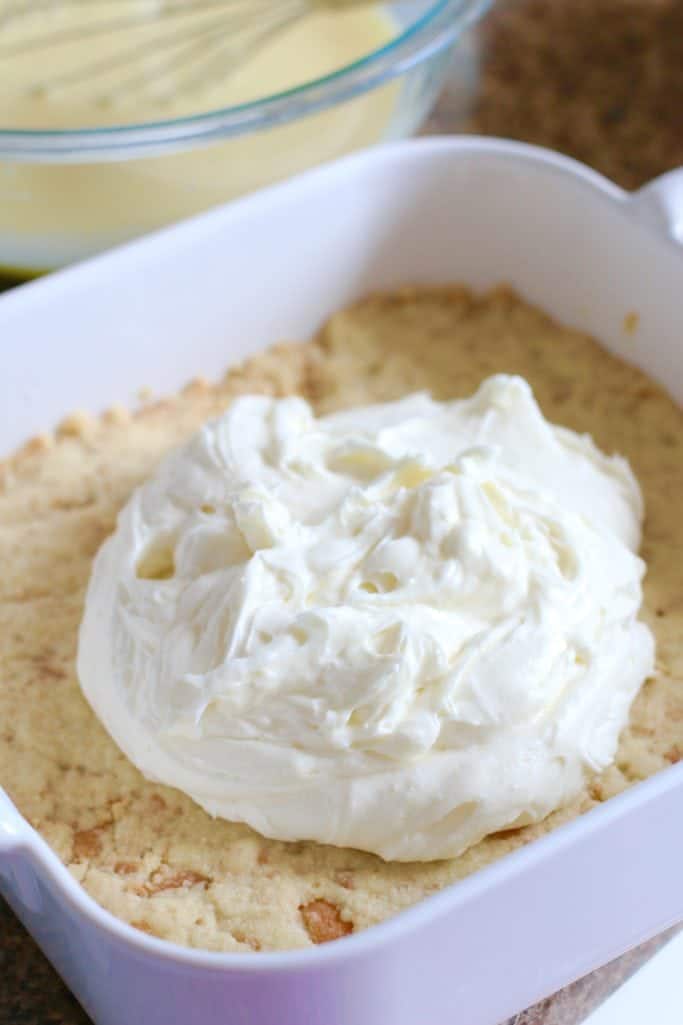 cream cheese mixture spread on a baked Nilla wafer crust