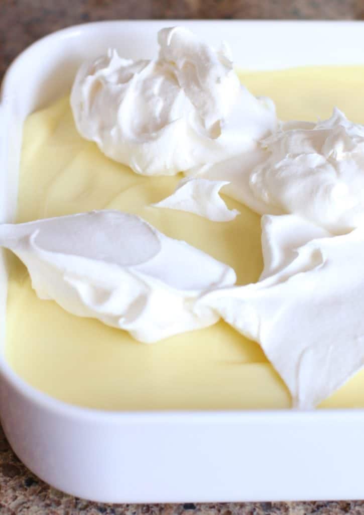 Cool Whip topping spread on top of banana cream pie pudding