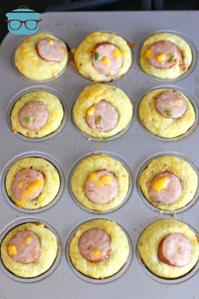 fully cooked cornbread sausage muffins in a muffin tin