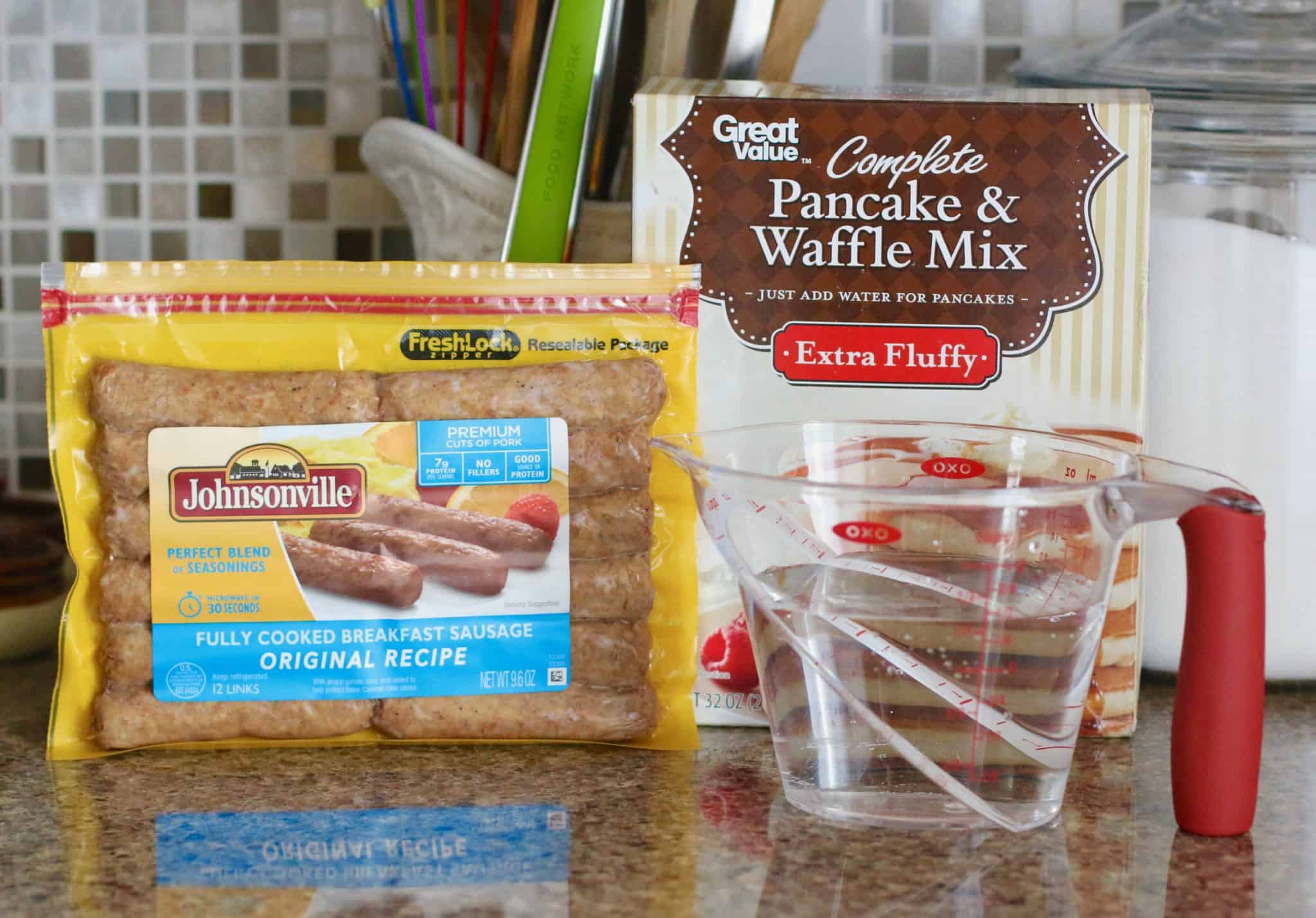 ingredients needed to make pancake sausage muffins: pancake mix, cooked sausages, water and maple extract.