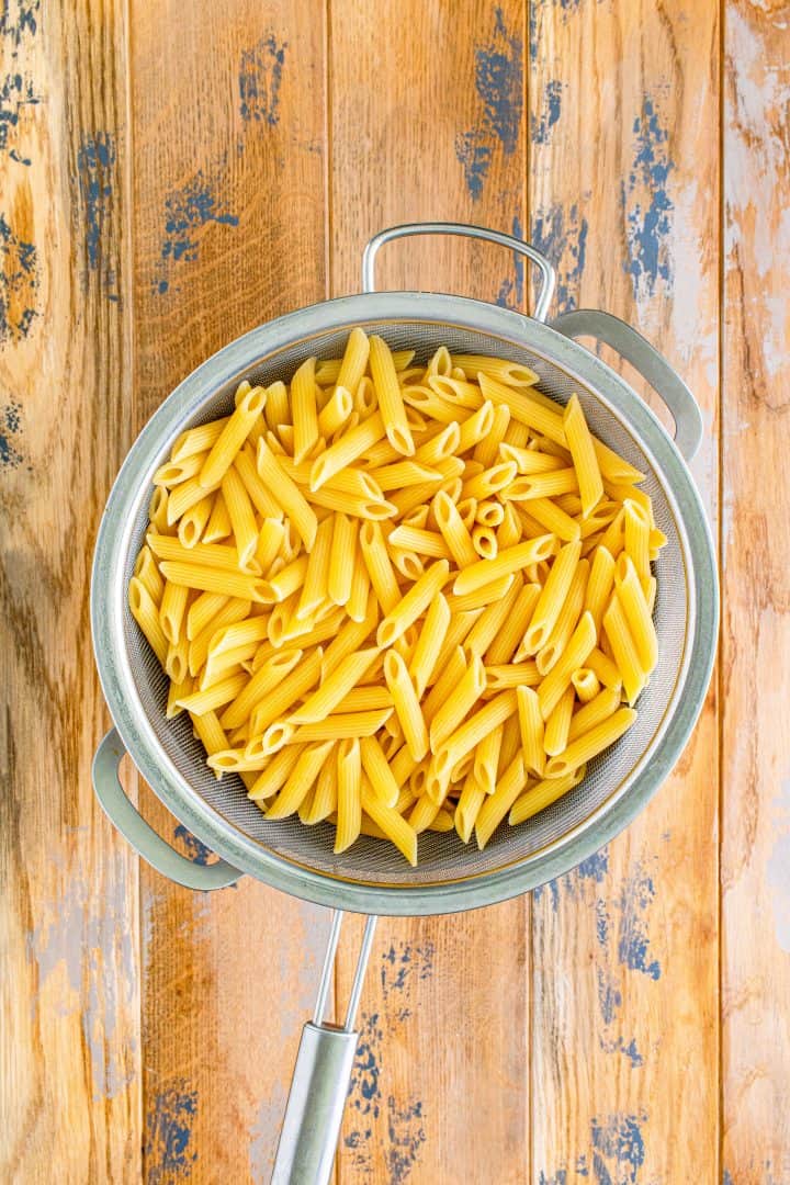 cooked and drained pasta in a colander.