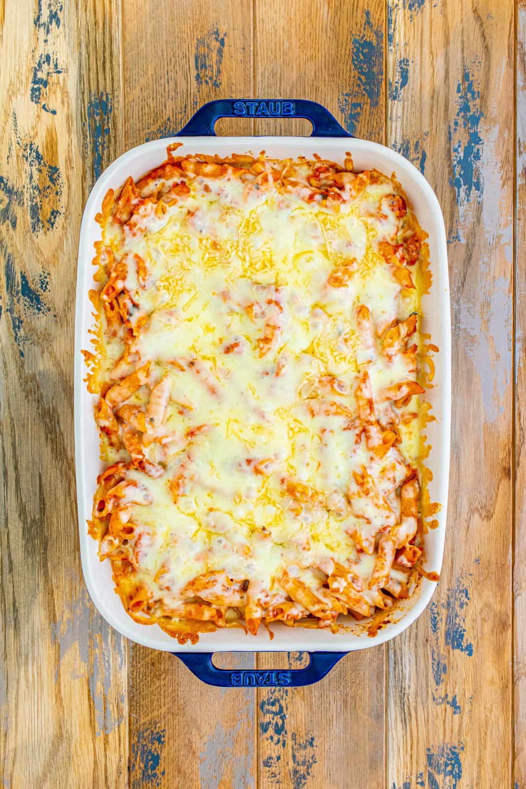 chicken parmesan casserole, overhead shot, with melted cheese on top.