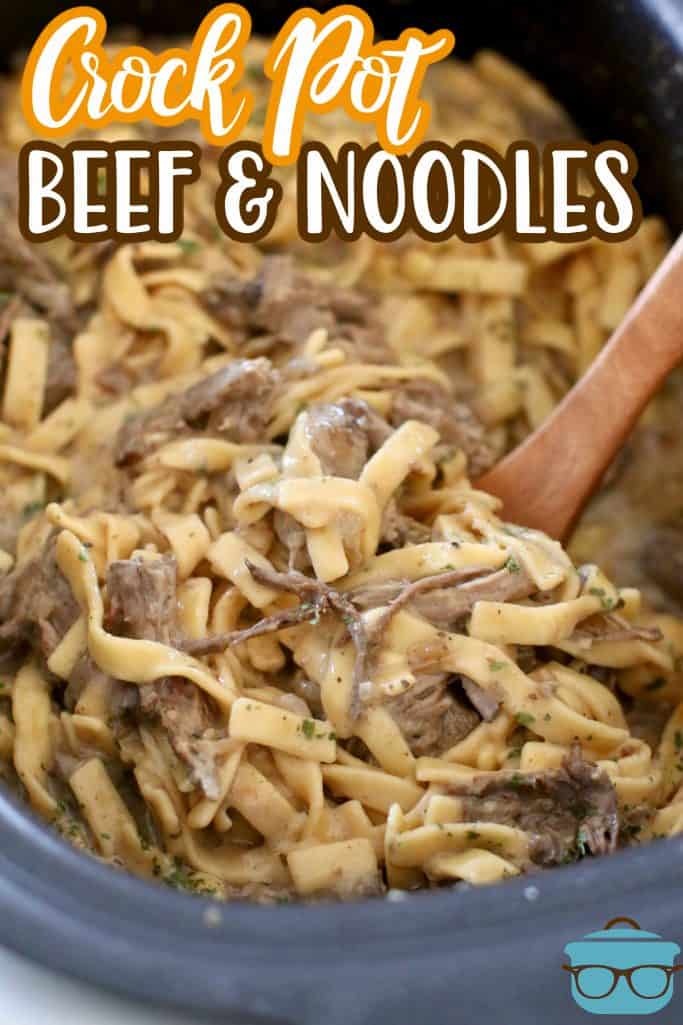 Crock Pot Beef and Noodles recipe from The Country Cook, beef and noodles shown in a slow cooker with a wooden spoon