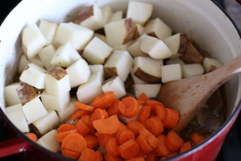 potatoes and carrots in dutch oven