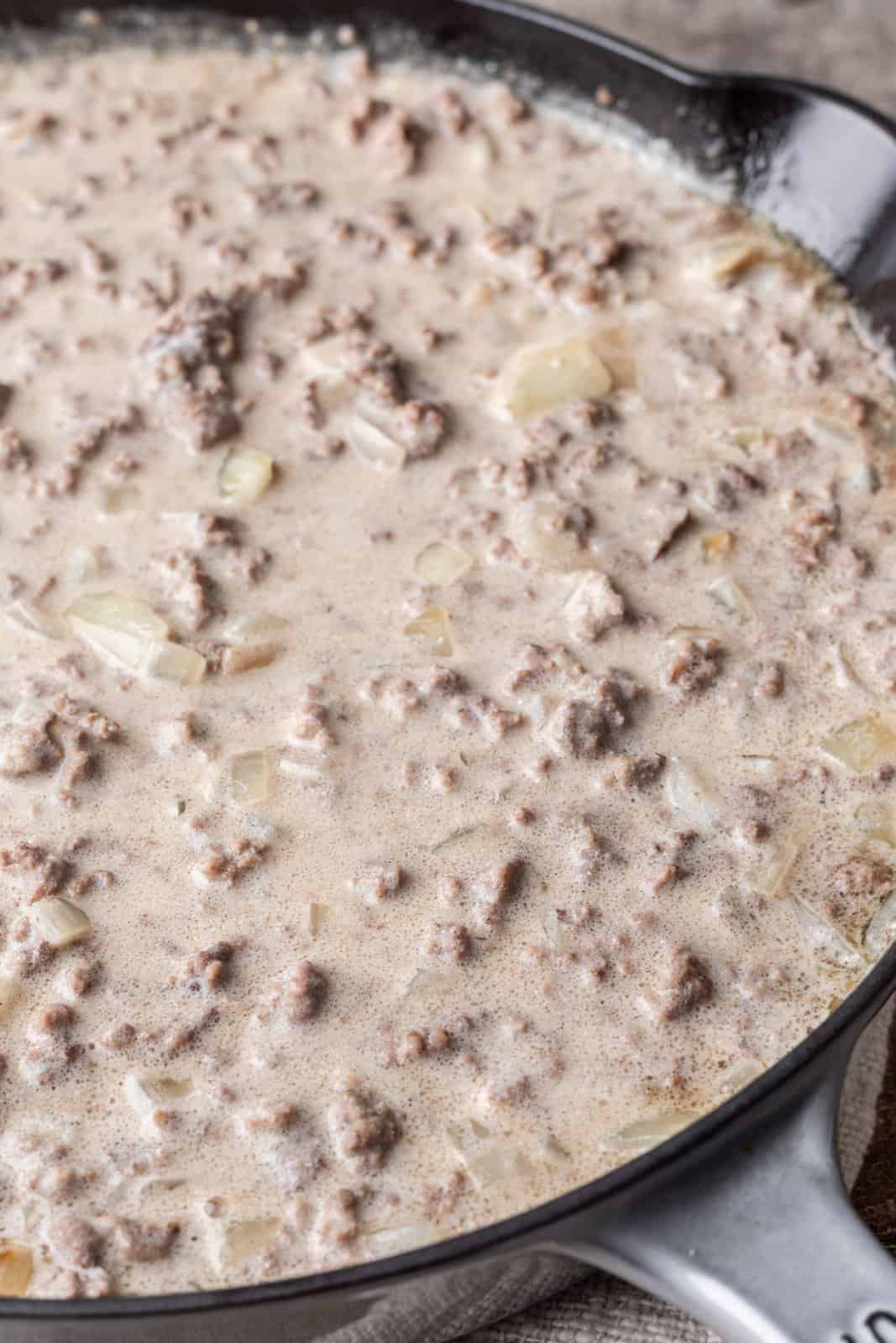 ground beef and creamy gravy in a large skillet. 