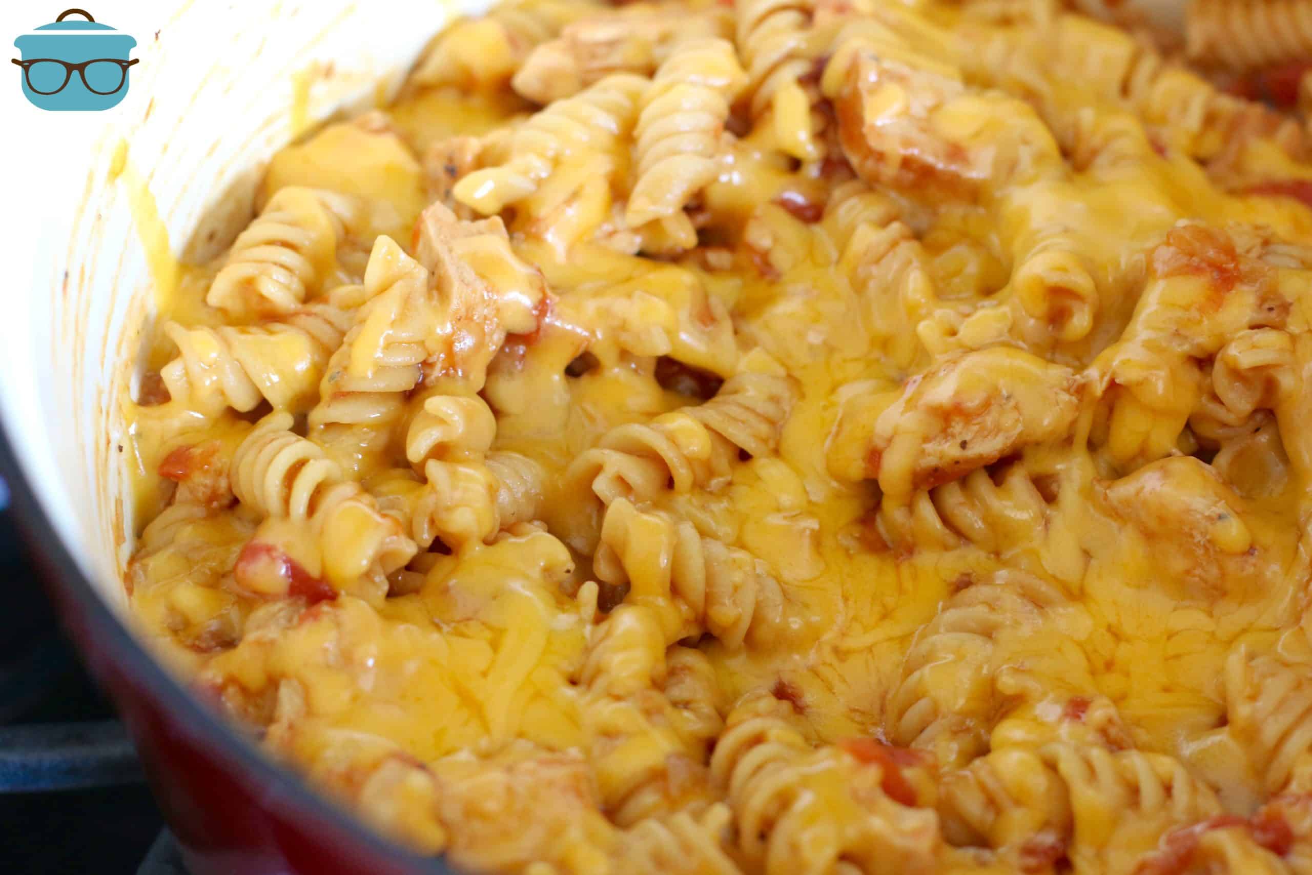 melted cheese on top of bbq chicken pasta.
