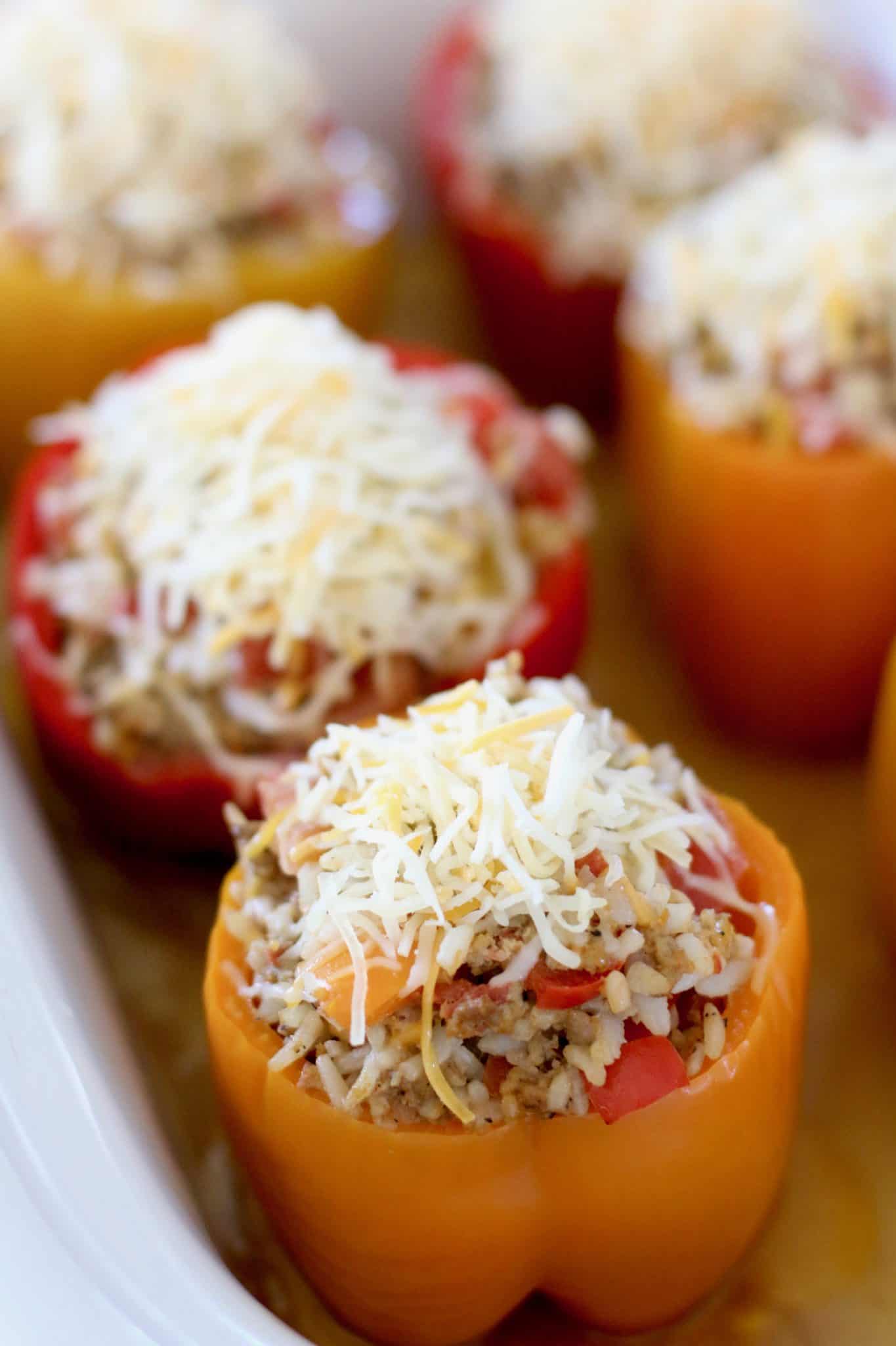 shredded cheese topped stuffed peppers.
