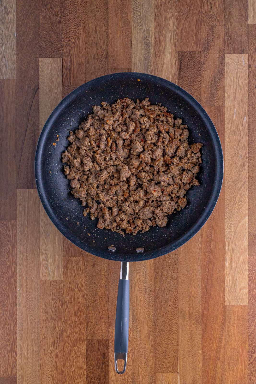 browned and crumbled sausage in a skillet. 