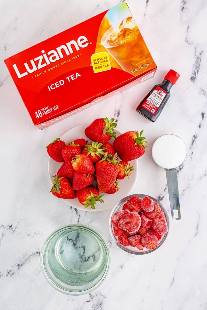 ingredients needed: Luzianne tea, sugar, fresh strawberries, strawberry extract, water, frozen strawberries