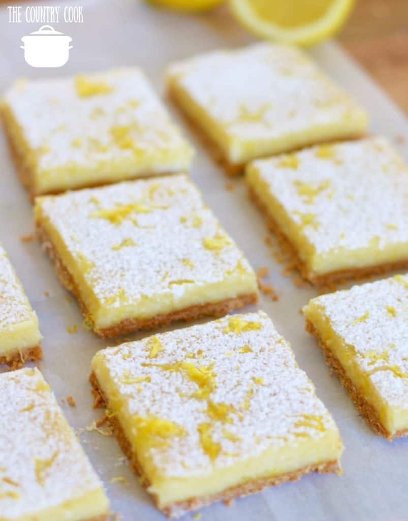 Cream Cheese Lemon Bars with vanilla wafers topped with powdered sugar