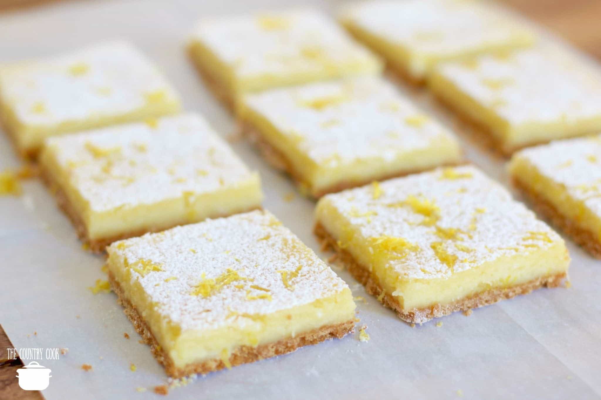 Creamy Lemon Bars with fresh lemon juice topped with powdered sugar.