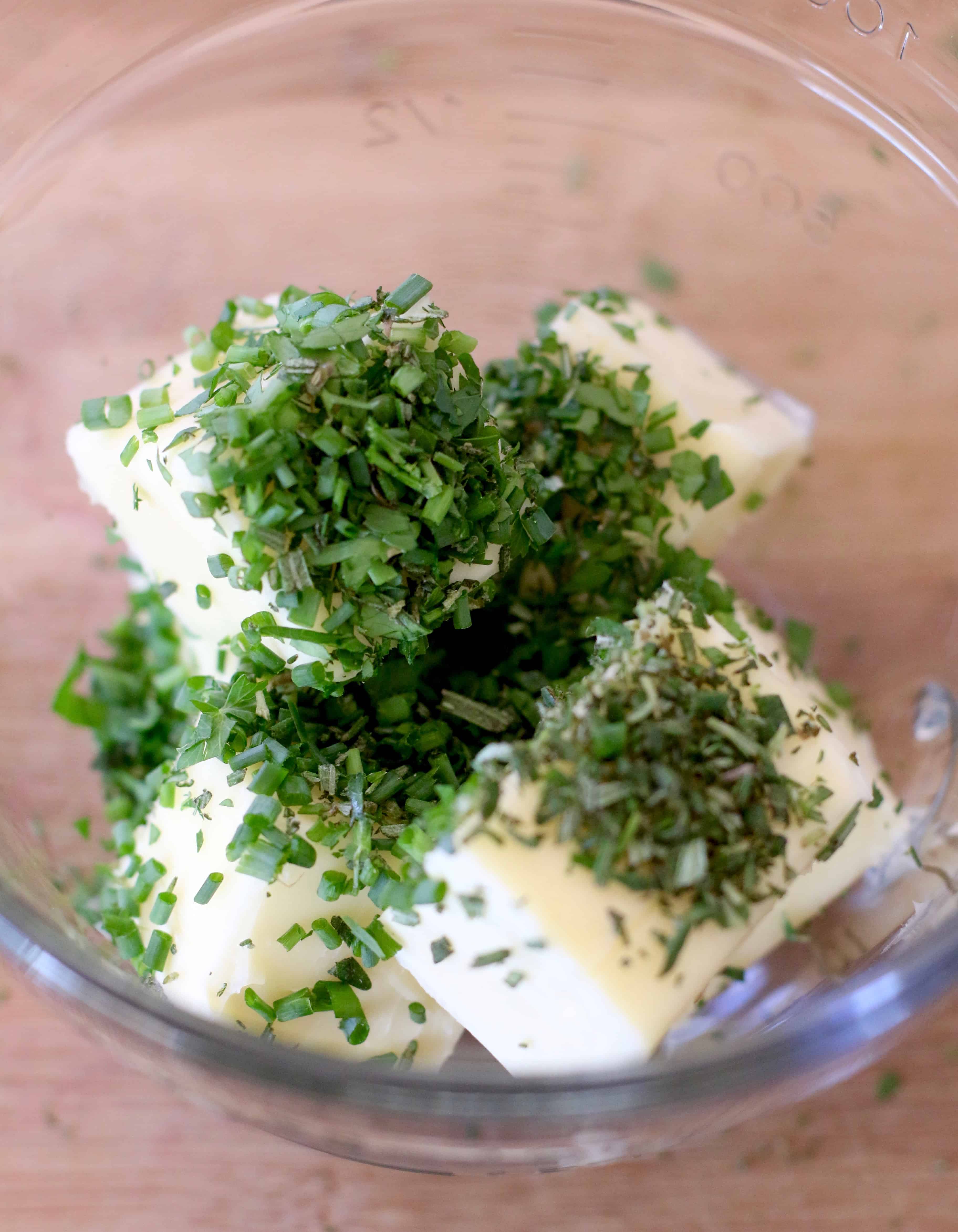 softened butter with chopped fresh herbs.