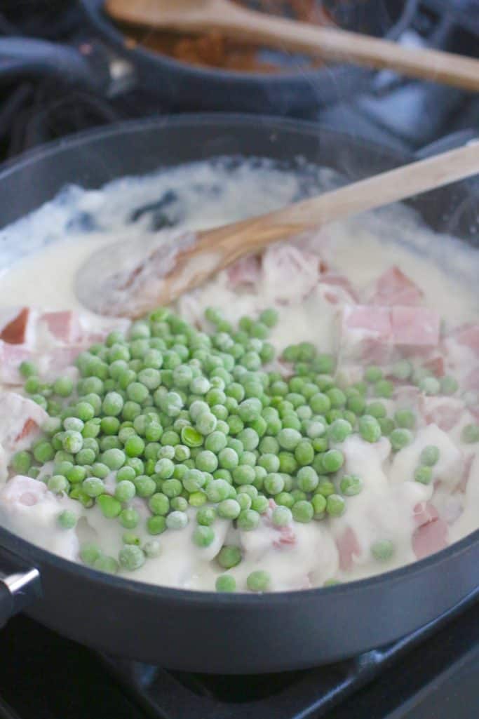 frozen peas added to creamy ham sauce