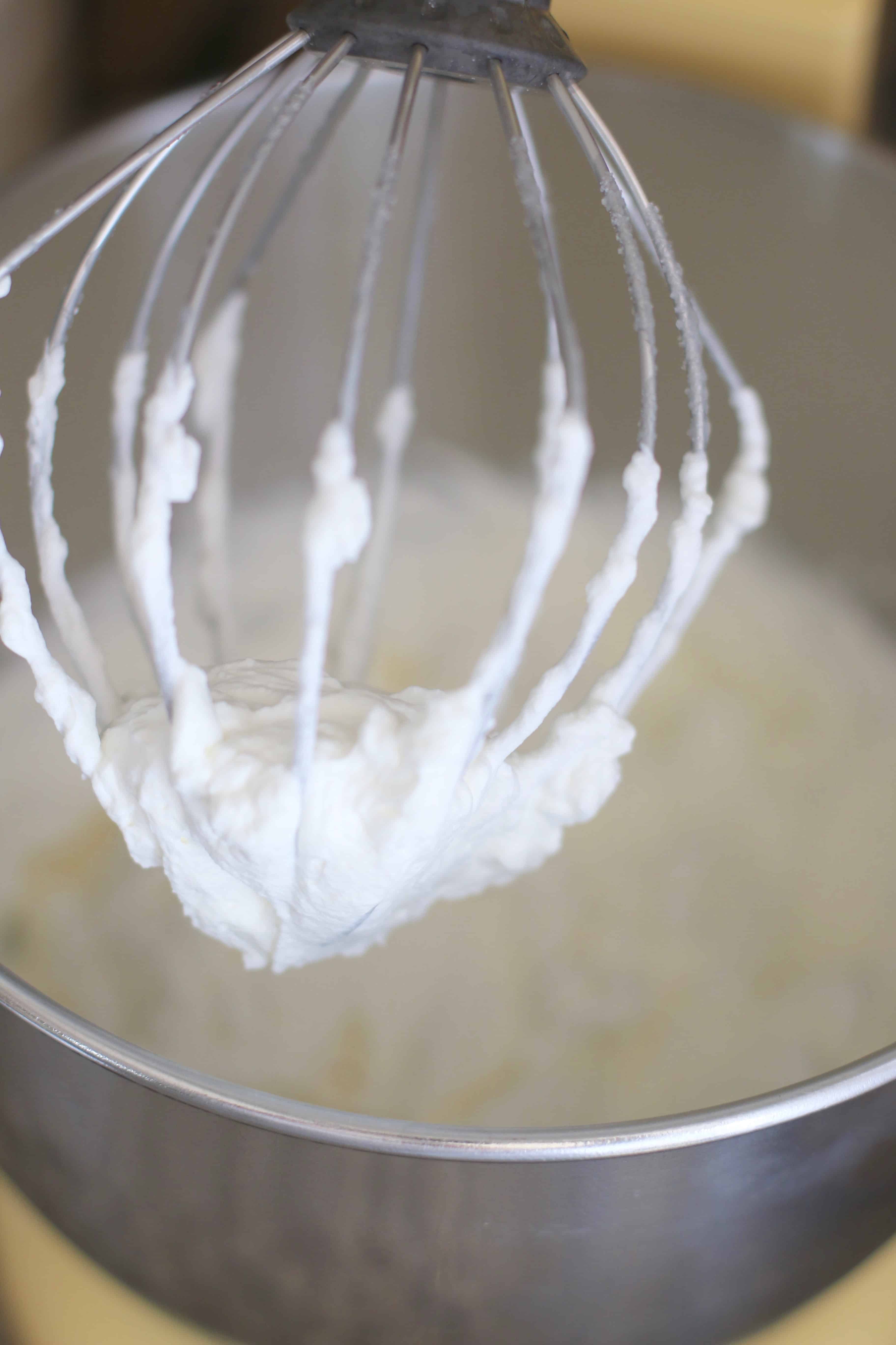 making homemade whipped cream in a stand mixer.