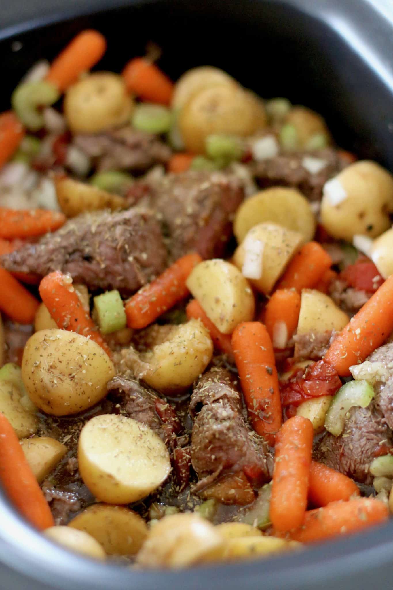seasoned beef stew with carrots.