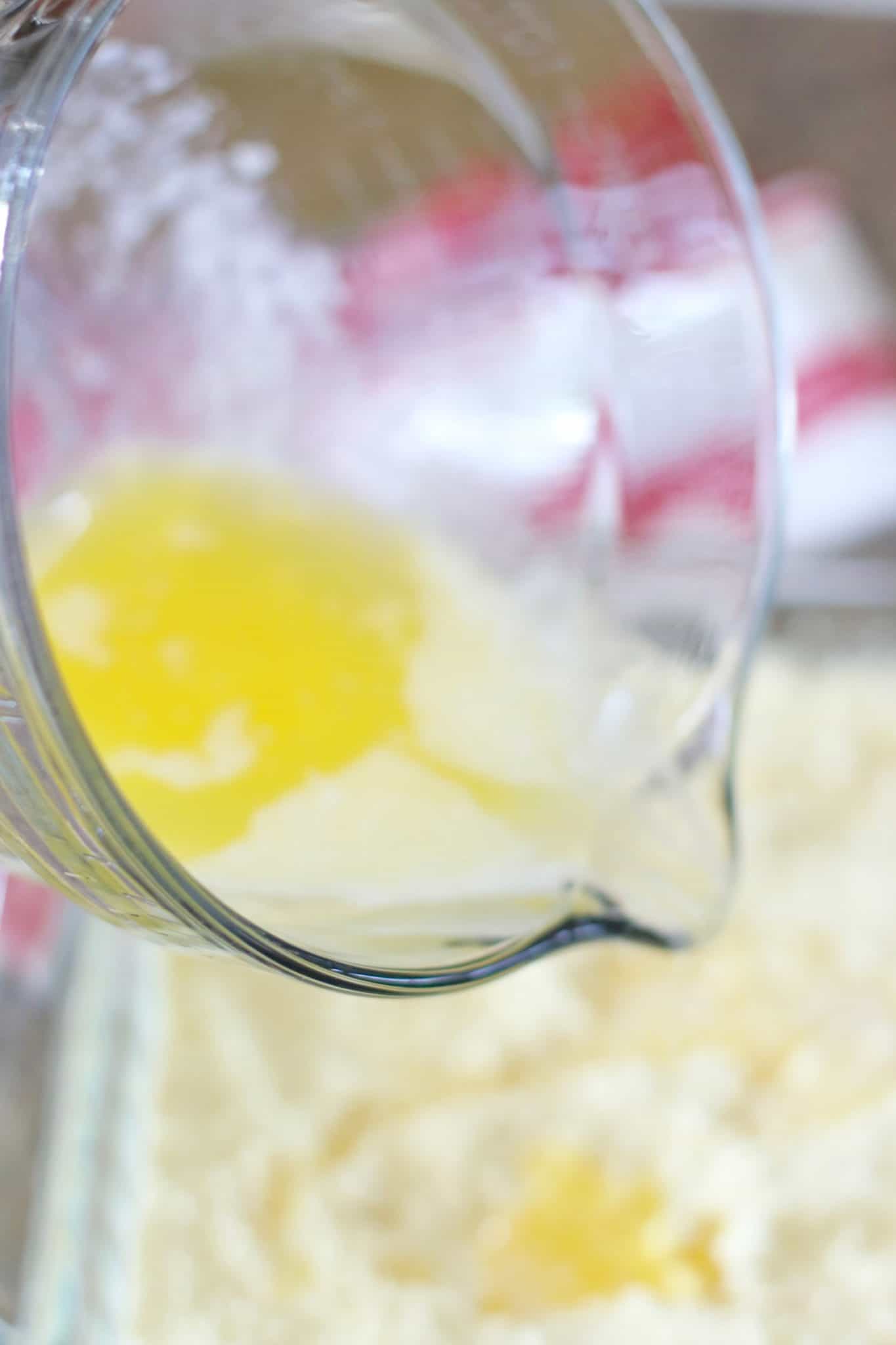 melted butter poured over yellow cake mix