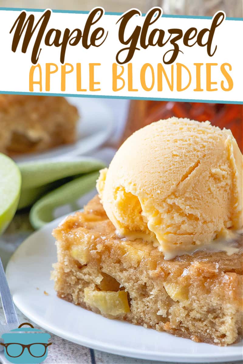 Maple Glazed Apple Blondies recipe from The Country Cook, slice of blondie on a small white plate with. scoop of vanilla ice cream on top.