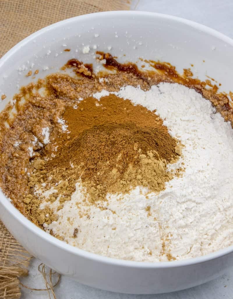 flour, spices added to gingerbread loaf batter.