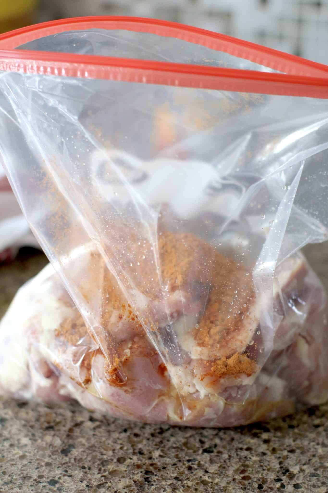 chicken thighs in a marinade in a bag. 