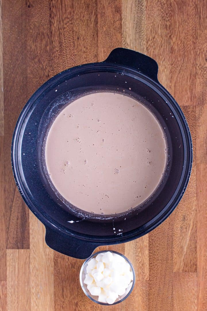 finished hot chocolate being shown in a round crock pot.