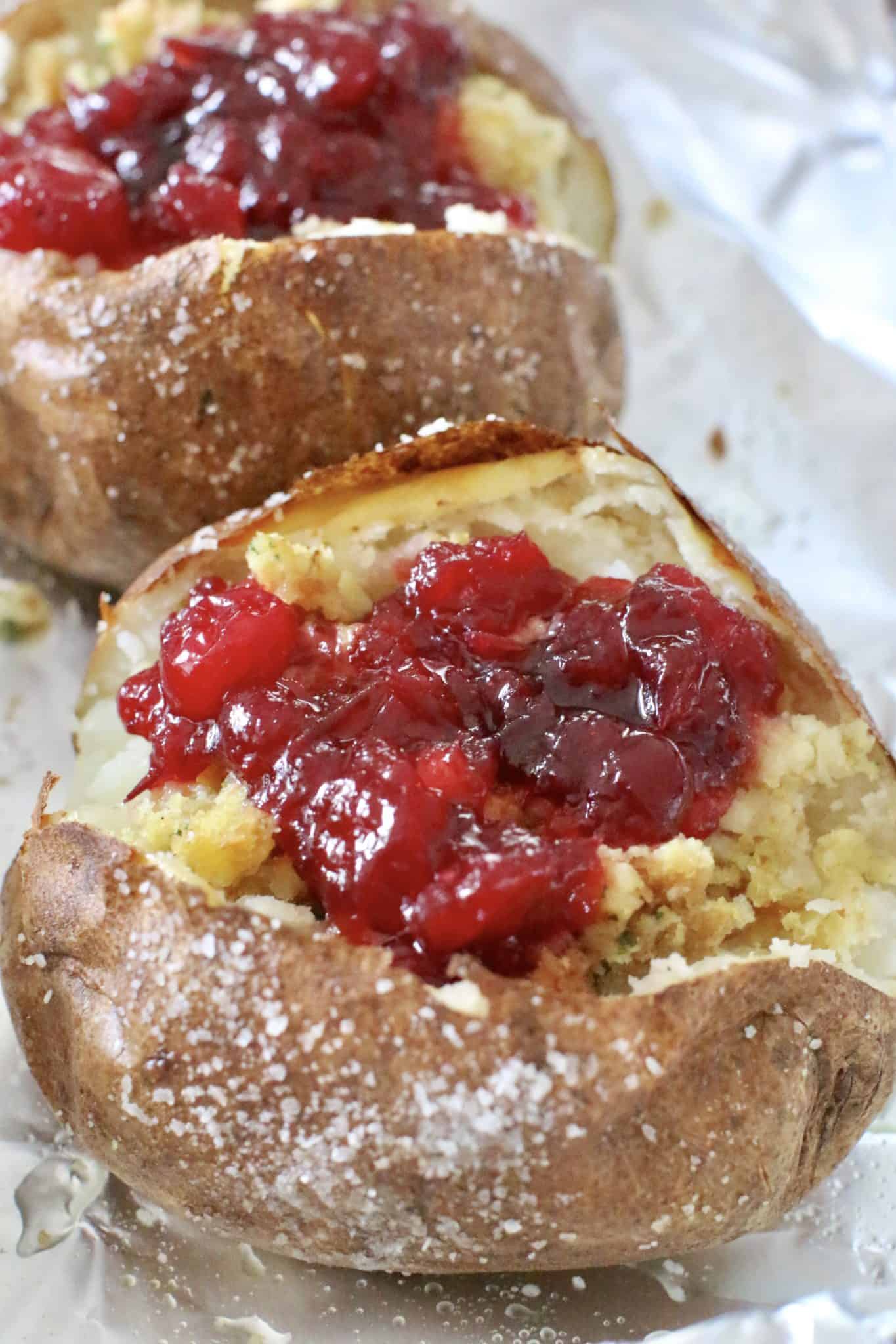 leftover cranberry sauce added on top of stuffing in a baked potato.