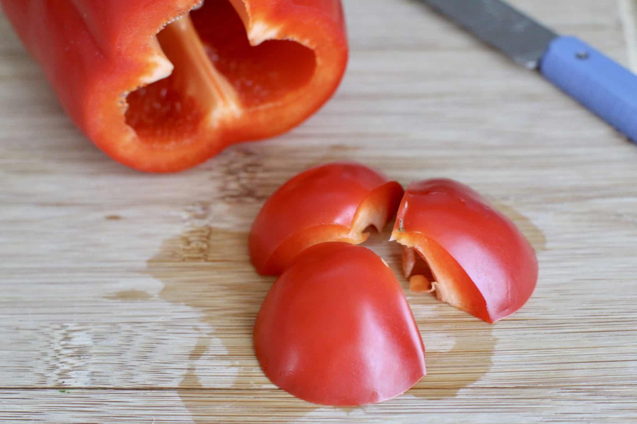 the end of a red pepper sliced into three parts.