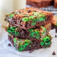 Mint Chocolate Chip Brownies recipe from The Country Cook, three slices of brownie shown stacked on top of each other