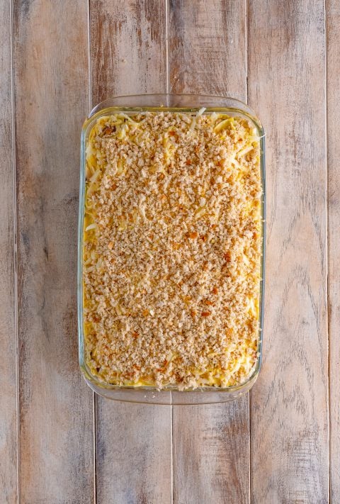 Bread crumbs on top of a layered casserole.