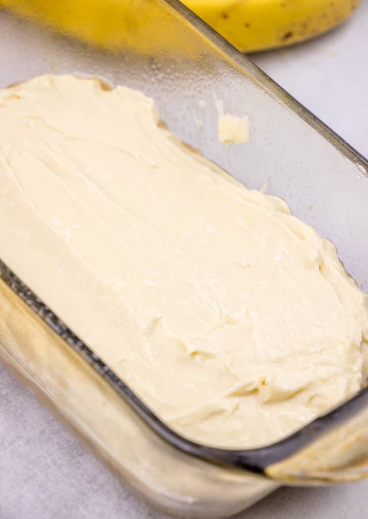 cheesecake filling batter on top of banana bread batter