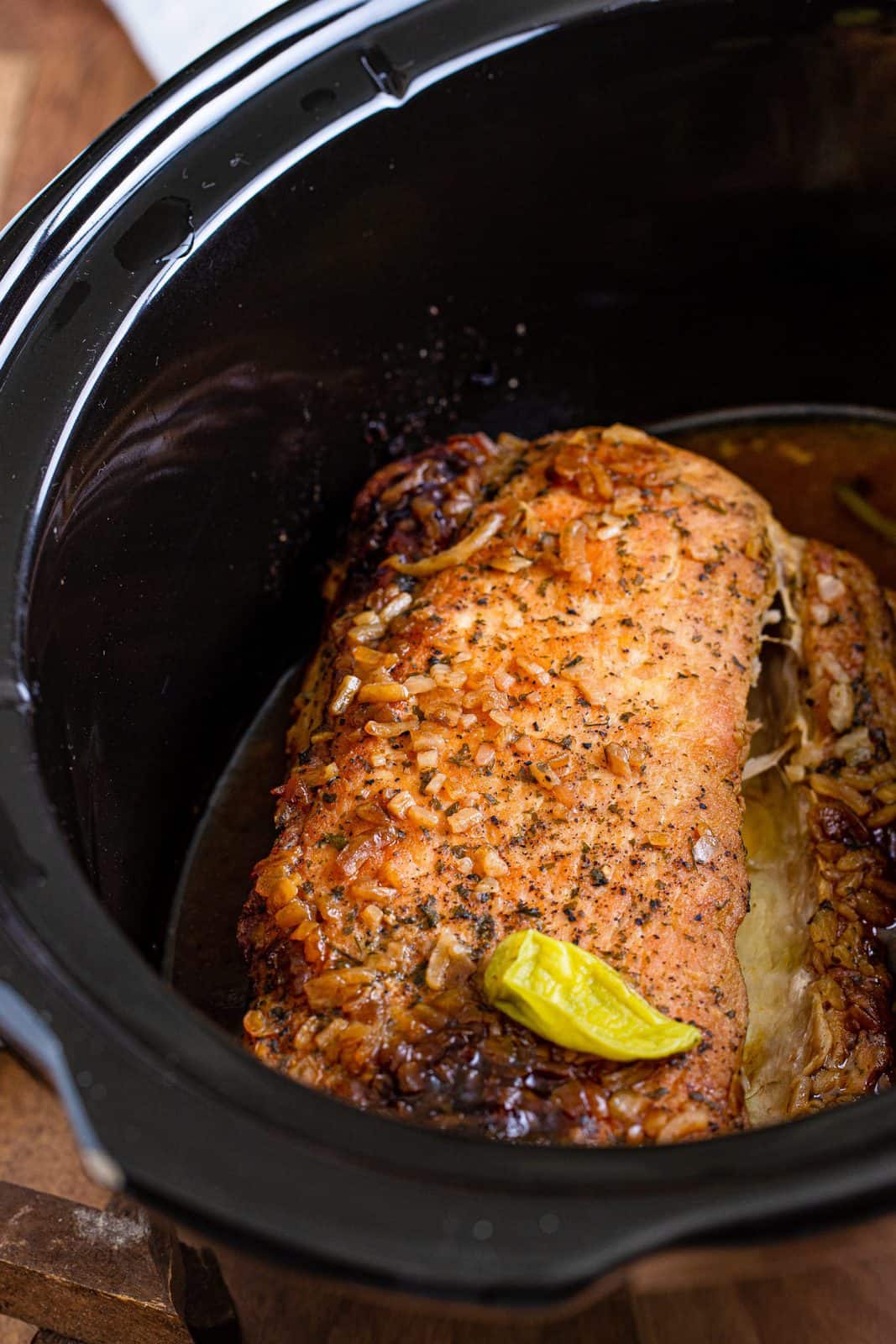 fully cooked pork loin roast in a slow cooker.