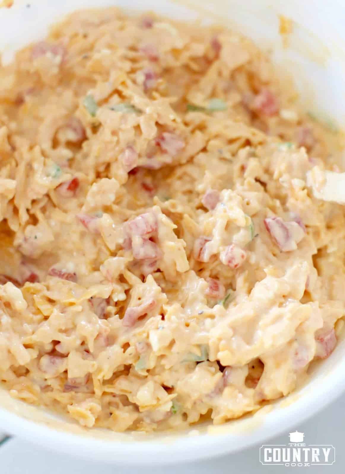 finished pimento cheese shown close up in a bowl.