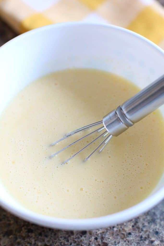 cold milk and banana instant pudding whisked together in a bowl