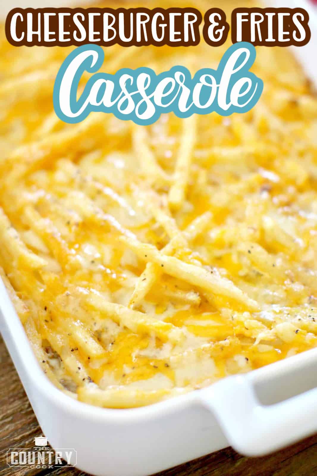 Cheeseburger and Fries Casserole recipe from The Country Cook. Fully cooked casserole shown with fries and melted cheese.