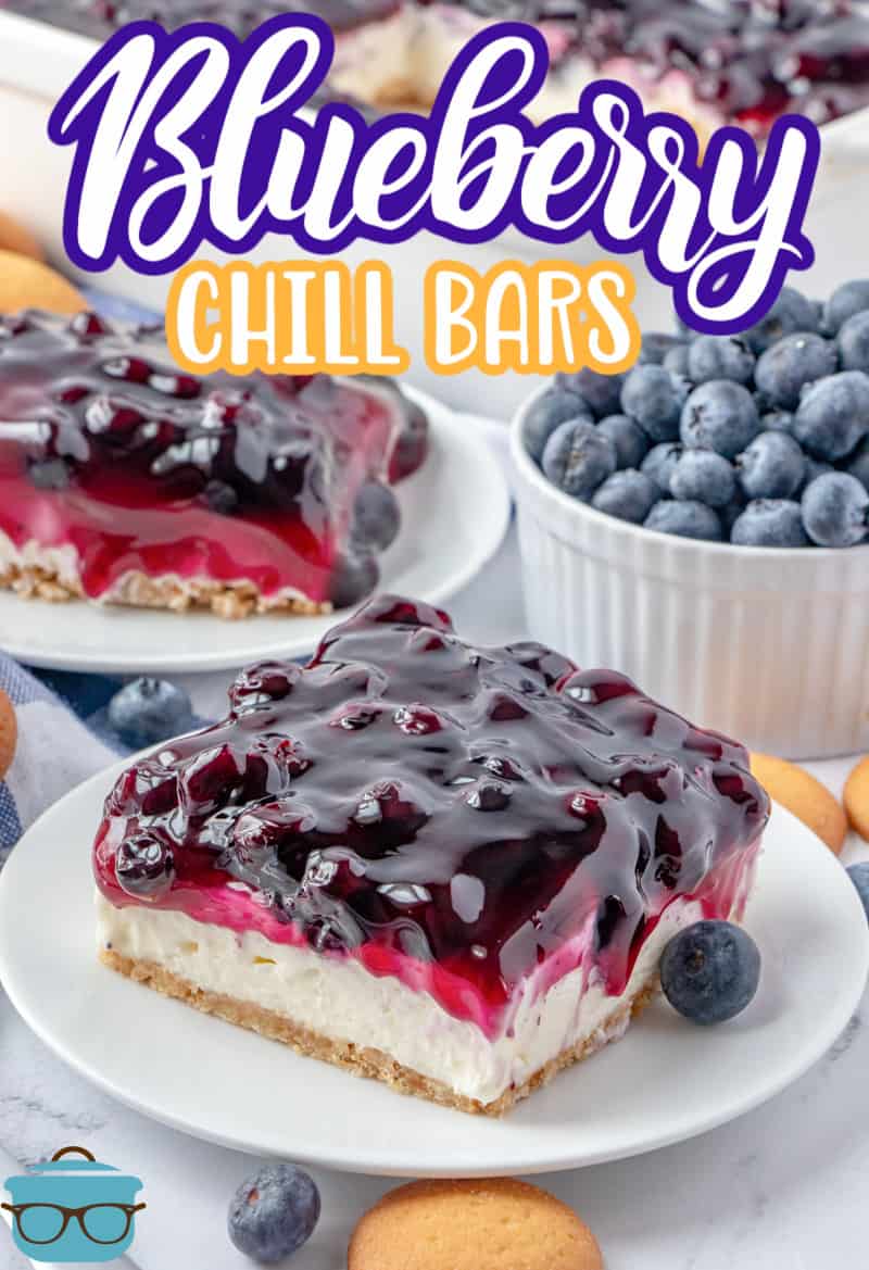 Blueberry Chill Bar recipe shown slice on a white plate with a bowl of fresh blueberries in the background.