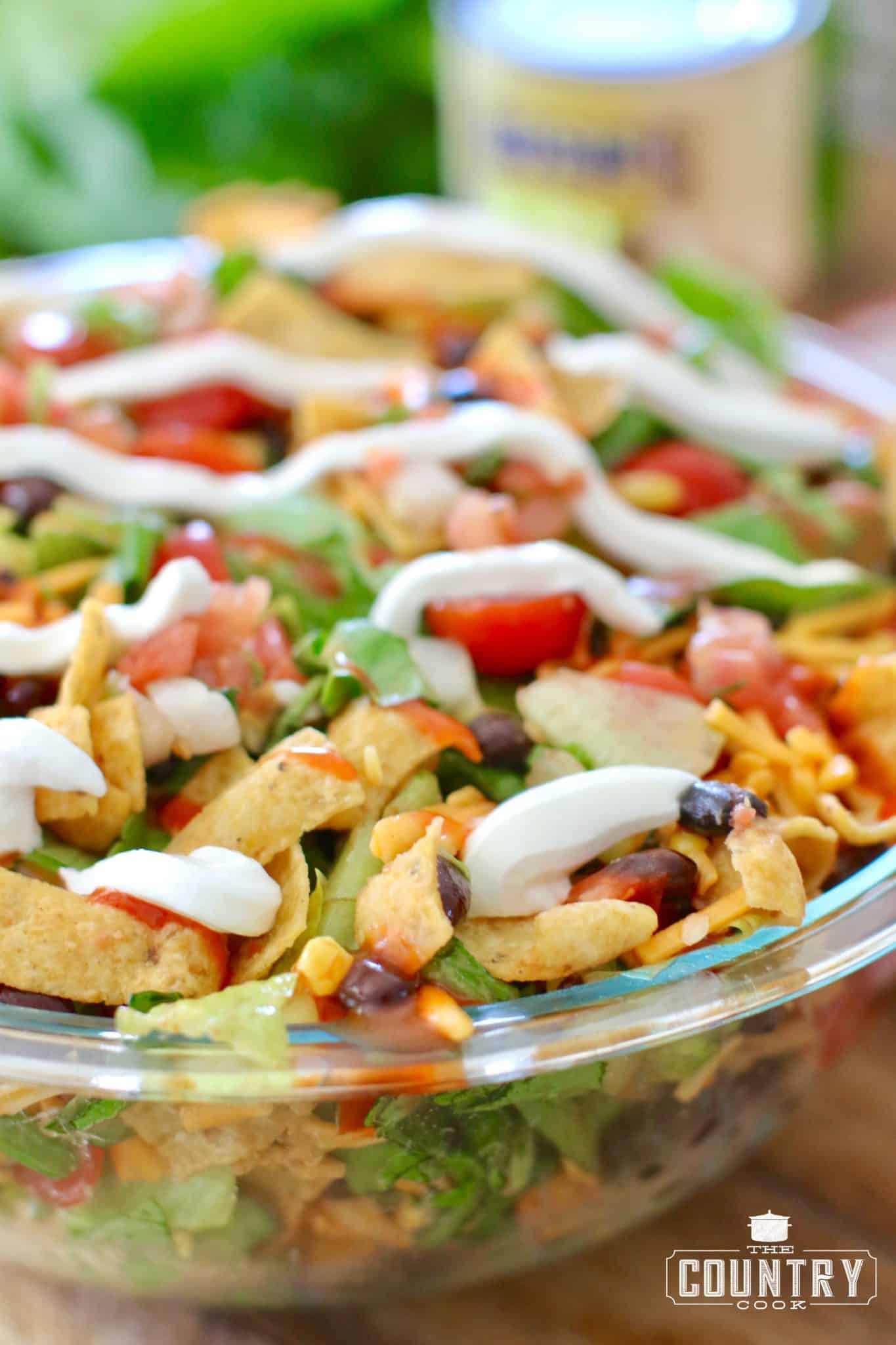 Vegetarian Taco Salad in a Large Bowl with Sour Cream.