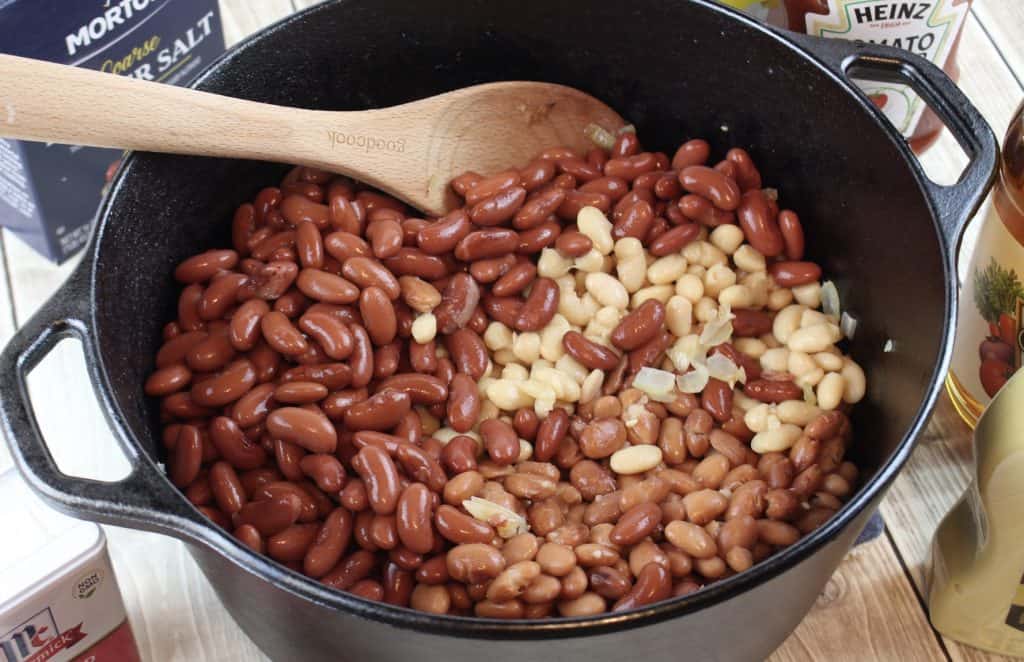 Drained, canned beans in pot