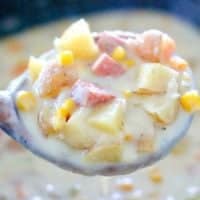 Potatoes, ham, corn and carrots in chowder