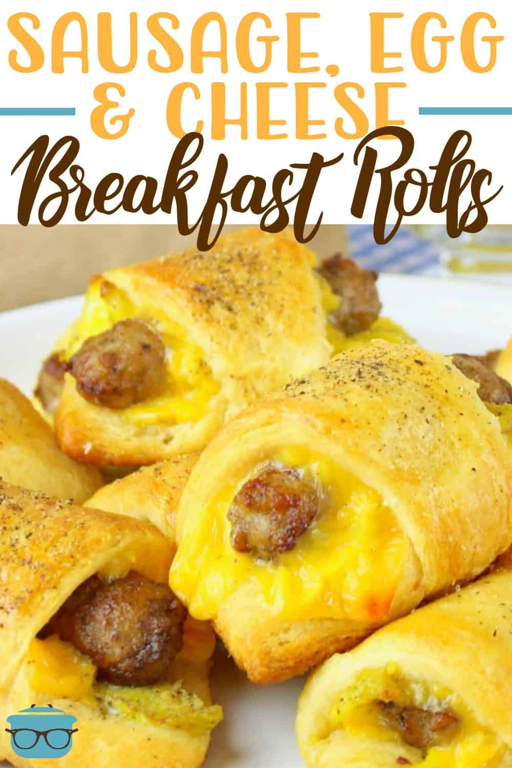 Sausage, Egg and Cheese Breakfast Rolls shown stacked on a white plate.