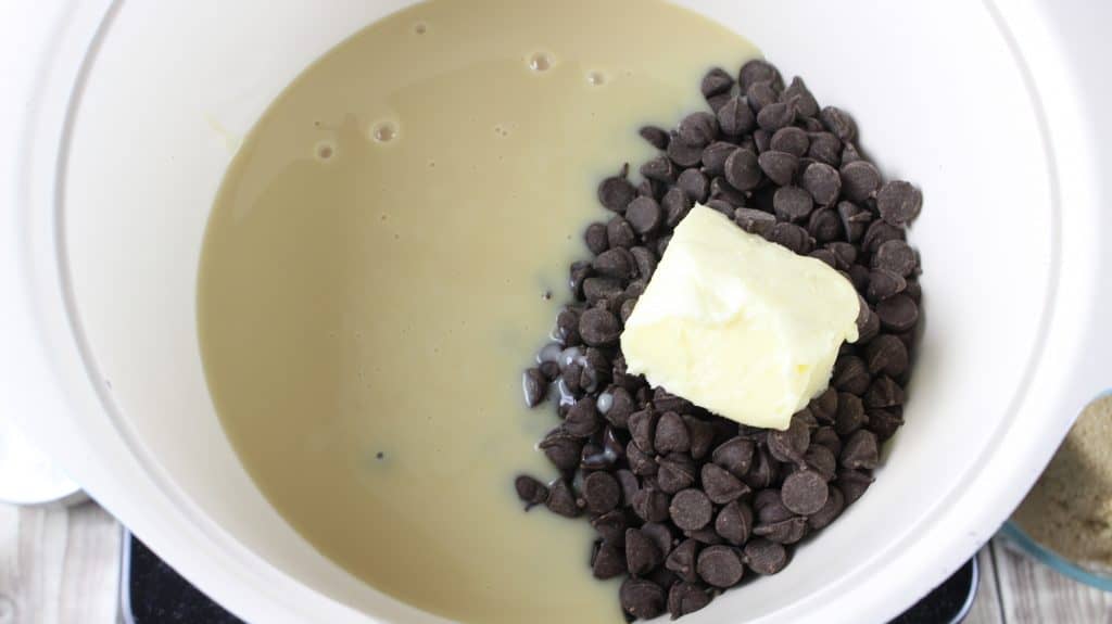 sweetened condensed milk, chocolate chips and butter in a sauce pot