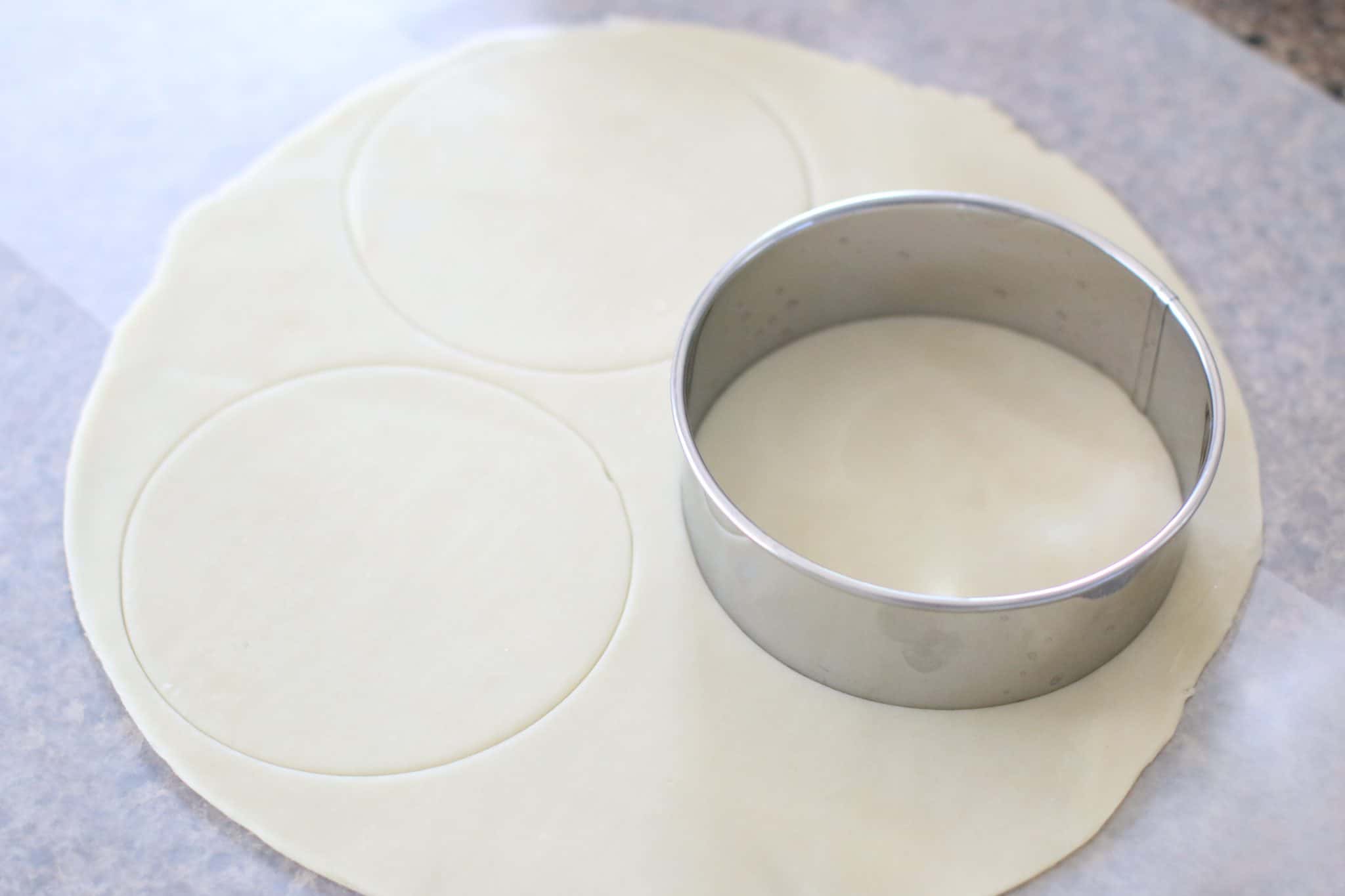 Pampered Chef Large Pie Cutter cutting out small pie crusts.