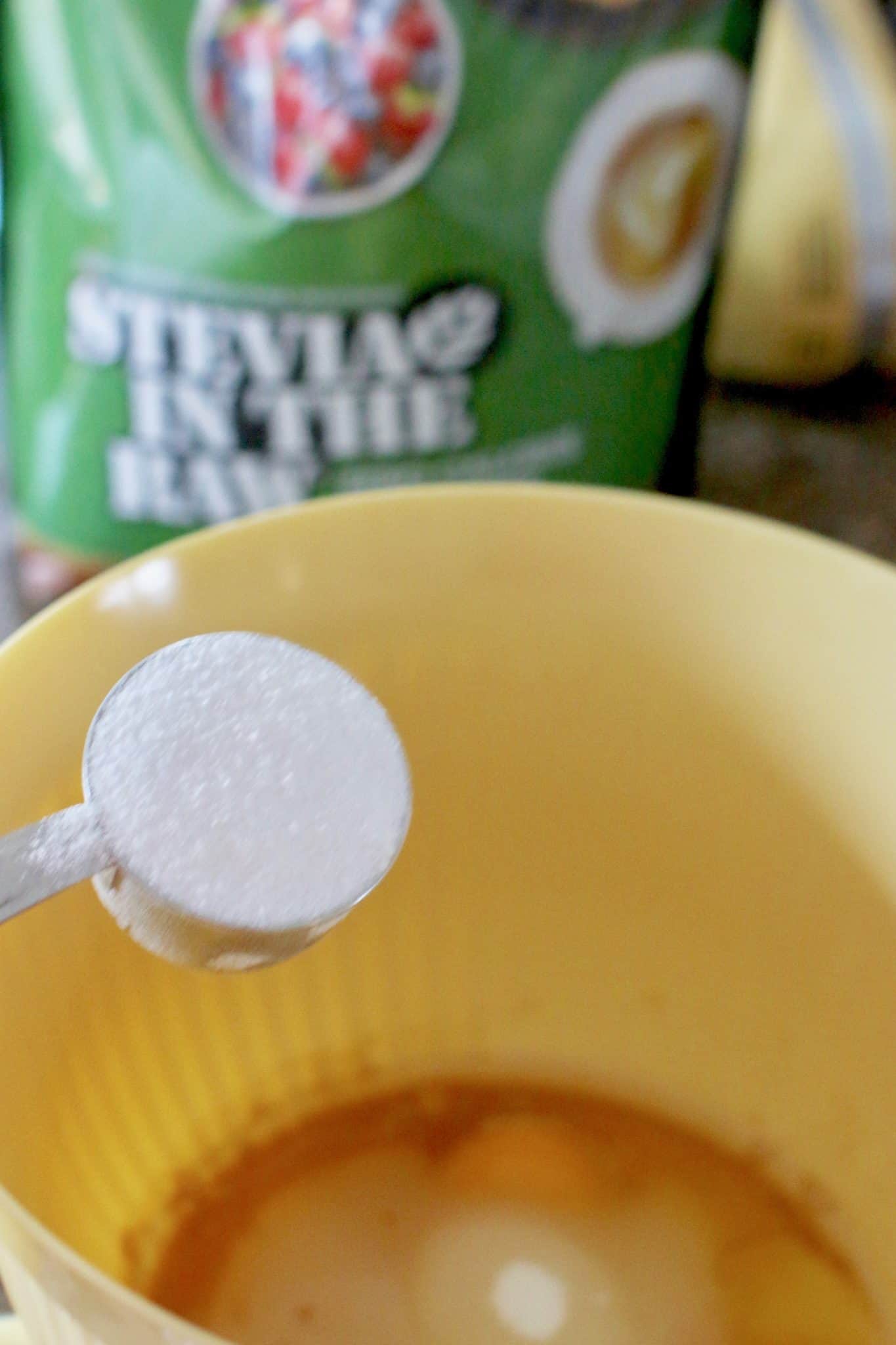 sugar, Stevia, vanilla extract and eggs in a bowl.