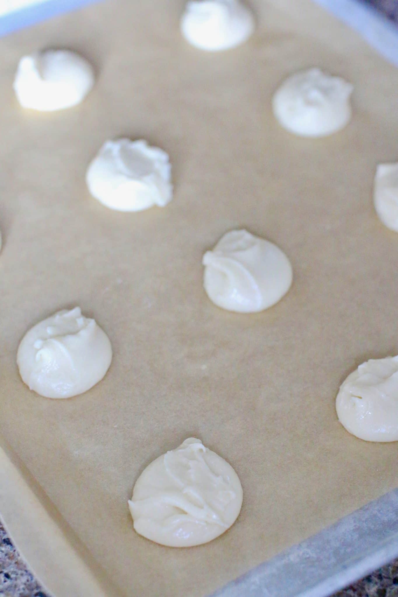 cookies on parchment-lined baking sheet.