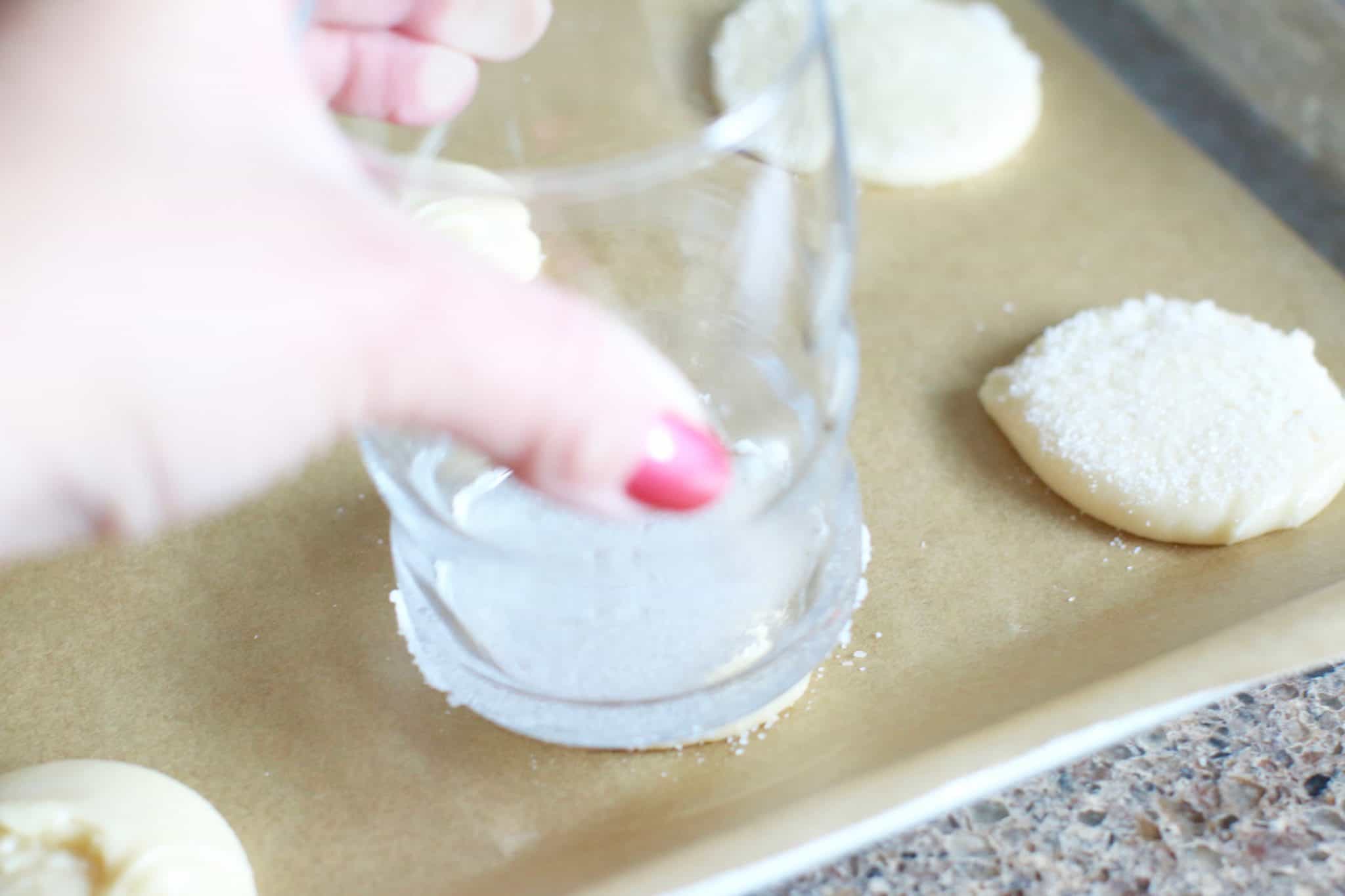 .gently press sugar onto cookie dough