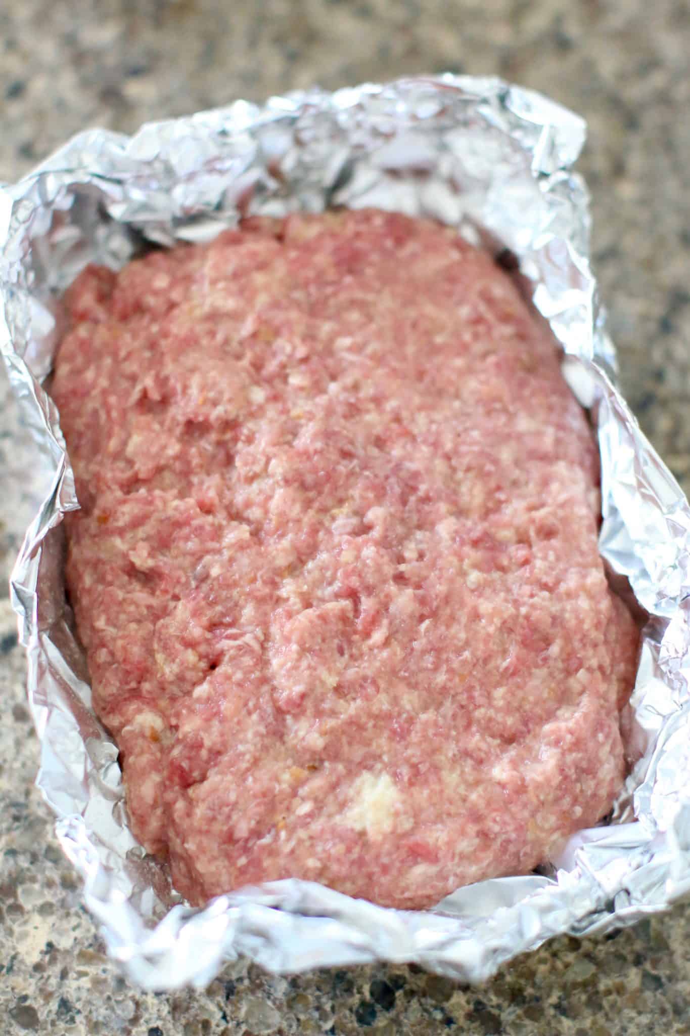 meatloaf mixture on aluminum foil.