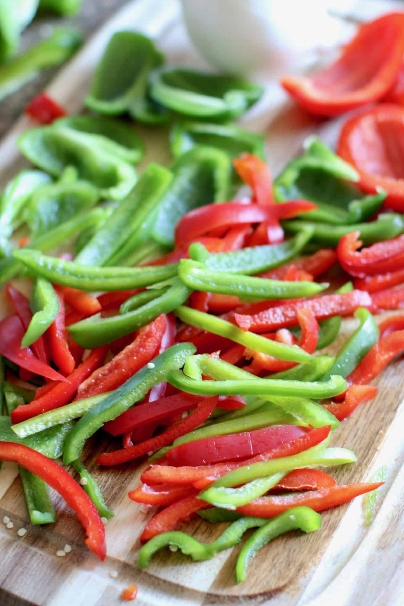 sliced green peppers, red peppers and onions