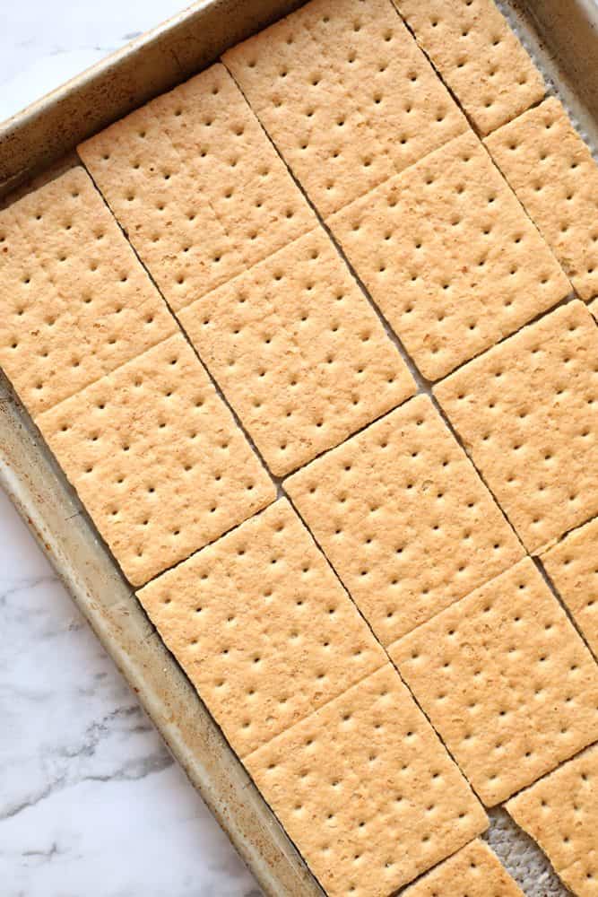 graham crackers lining a baking sheet,