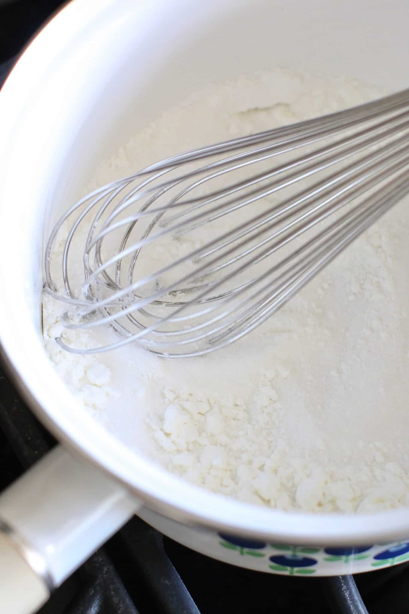sugar, cornstarch, salt in a white saucepan with a whisk. 