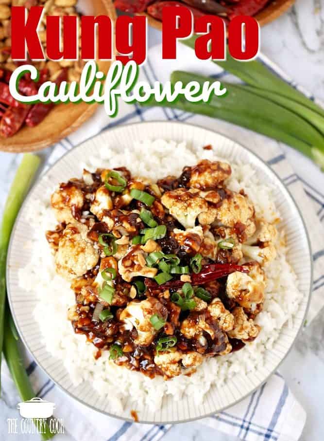 Kung Pao Cauliflower recipe from The Country Cook. Serving showed on a bed of rice on a white plate. 