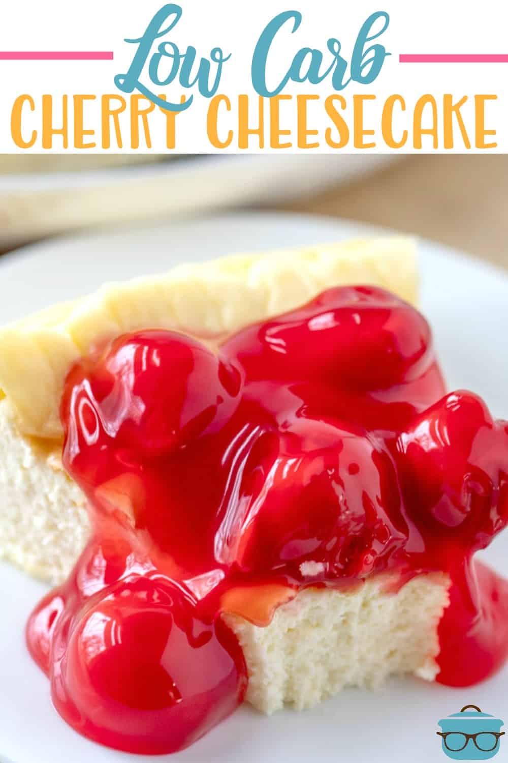 slice of cherry cheesecake on a white plate.